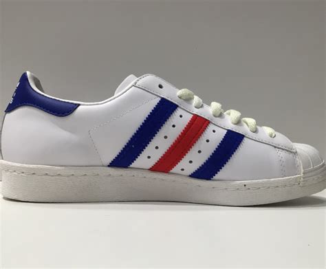 adidas striped leather shoes.